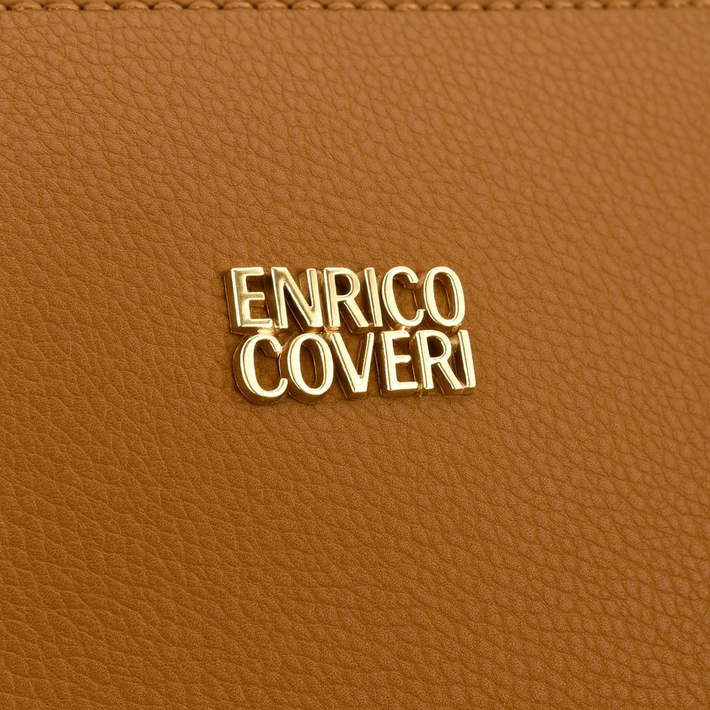 https://cdn.shopify.com/s/files/1/0280/1500/1735/files/freepik__closeup-shot-focusing-on-the-enrico-coveri-logo-an__85016.webp?v=1754472109